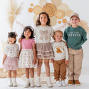 Kids wearing fun fall outfits 
