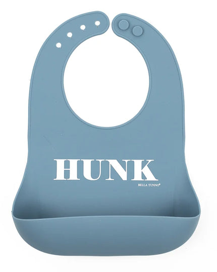 Blue baby bib with 'HUNK' printed on it
