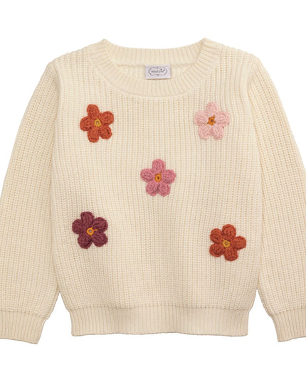 Cream sweater with crochet flowers