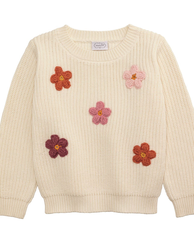 Cream sweater with crochet flowers