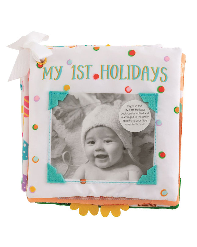 Baby book titled 'My 1st Holidays' with a photo of a baby on the cover.