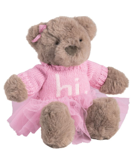 Teddy bear in a pink sweater dress with 'hi' written on it 