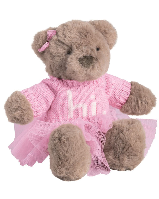 Teddy bear in a pink sweater dress with 'hi' written on it 