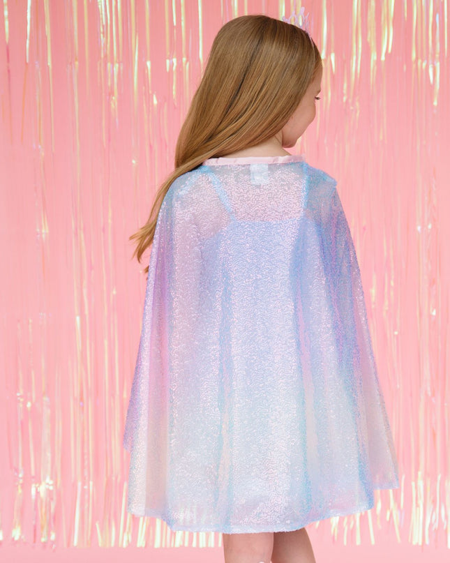 Girl wearing rainbow sequin dress up cape and pink crown