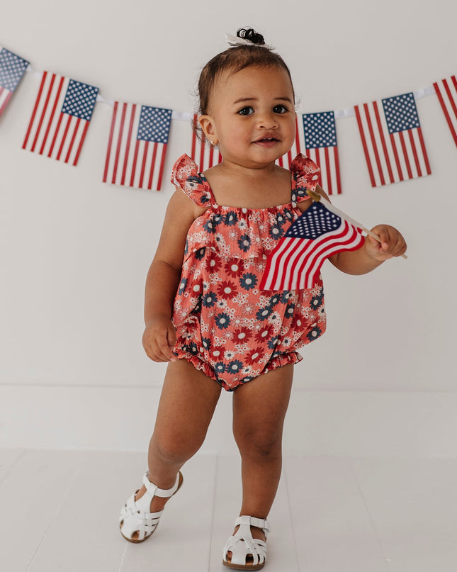 Baby wearing floral romper