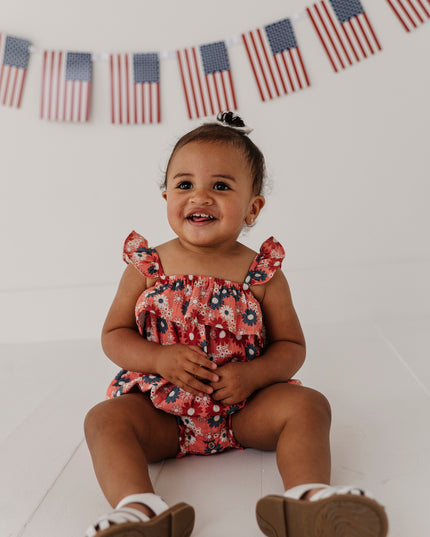 Baby wearing floral romper