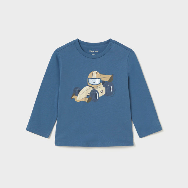 A blue long-sleeve children's t-shirt featuring a cartoon graphic of a race car driver with a helmet 