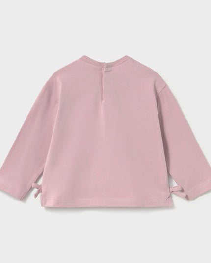 Back of long Sleeve Mauve Shirt with side ties and embroidered flower pocket