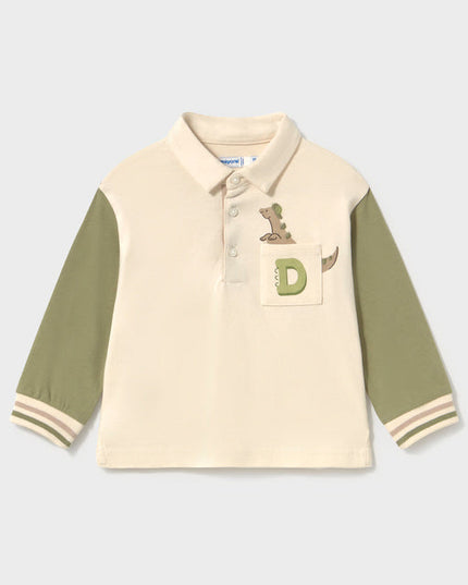 Children's long sleeve polo shirt with green sleeves and a pocket featuring a dinosaur peeking out