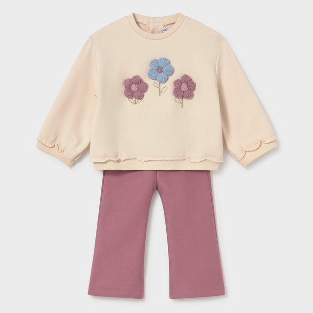 Cream colored sweatshirt with crocheted flowers and mauve pants