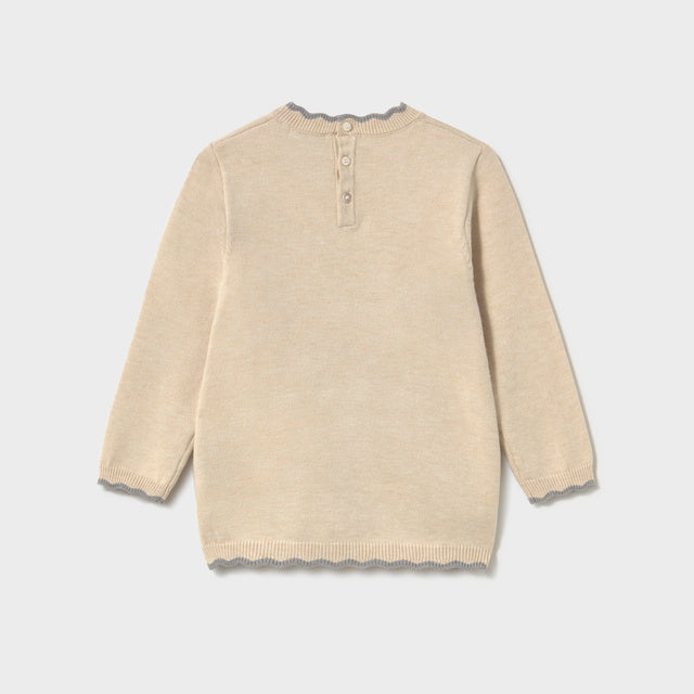 Back of beige sweater dress with ballerina teddy bear design 