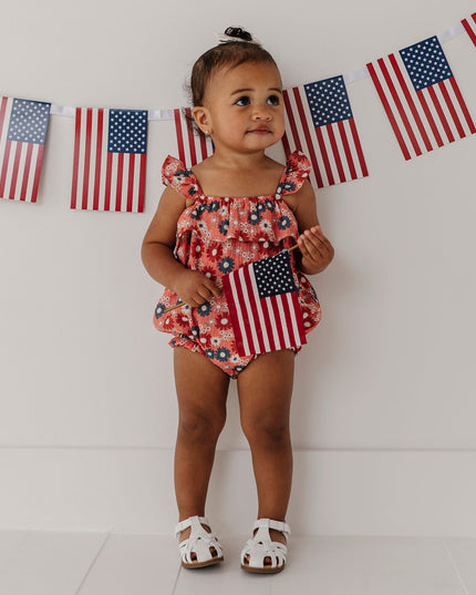Baby wearing floral romper