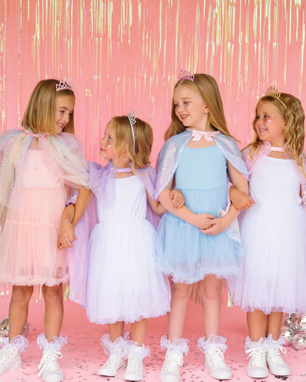 Girls wearing fun and colorful dress up outfits