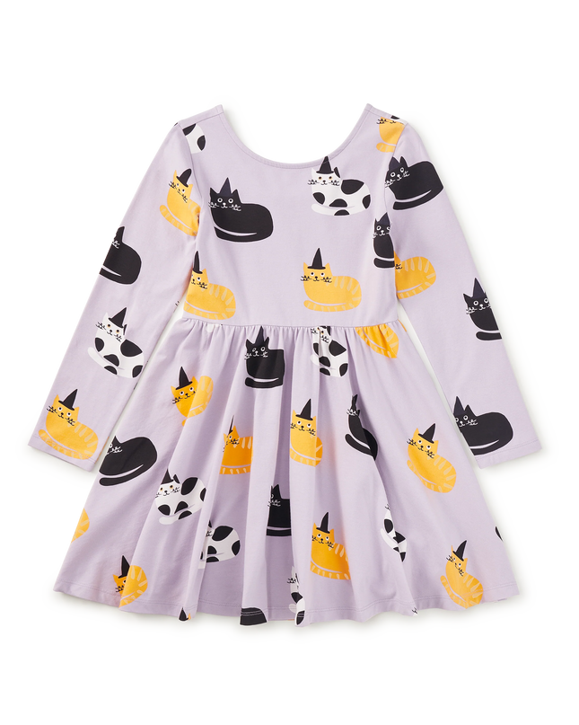 Purple dress with black, white and gold cats wearing black witch hats