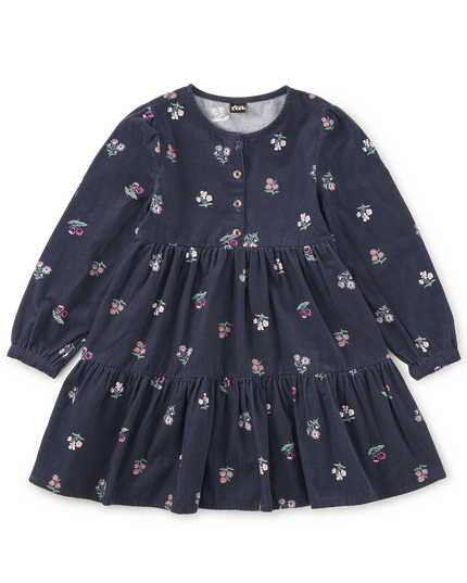 A deep midnight corduroy shirtdress with floral pattern