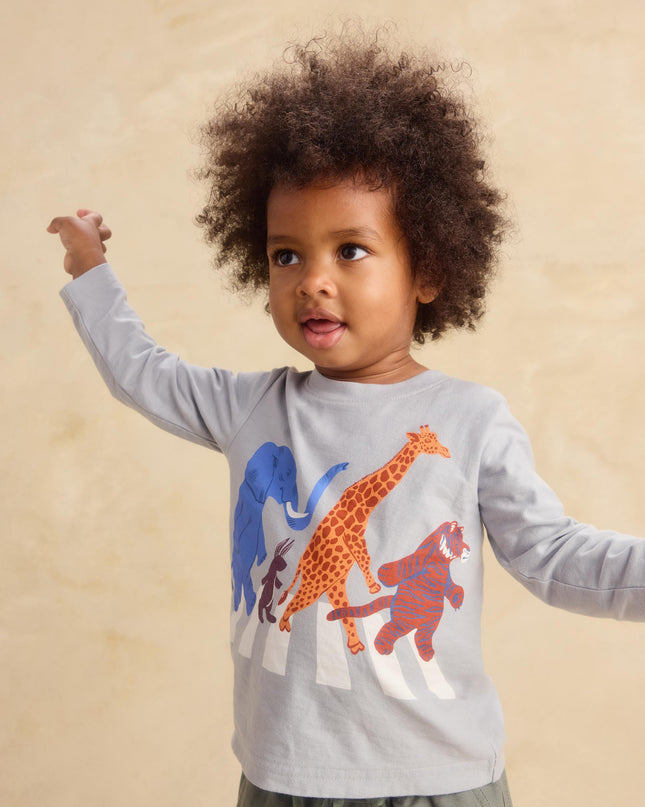 Boy wearing Light grey-blue long sleeve tee shirt with animals crossing Abbey Road