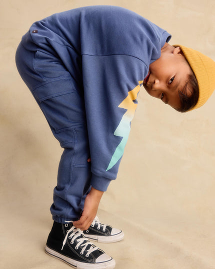 Boy wearing Blue cargo pocket jogger pants and sweatshirt 