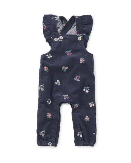 Deep midnight corduroy overalls with floral pattern and ruffle straps