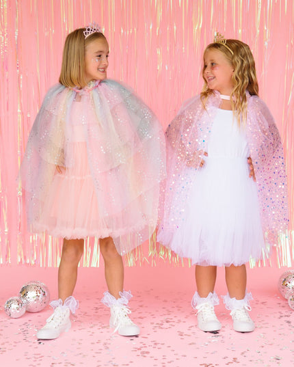 Girls wearing fun and colorful dress up outfits
