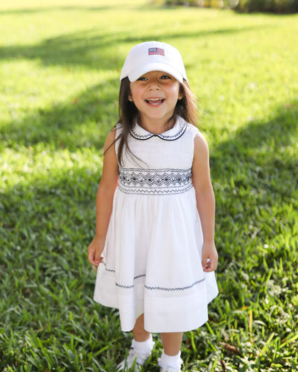 Girl wearing American Flag Bow Baseball Hat
