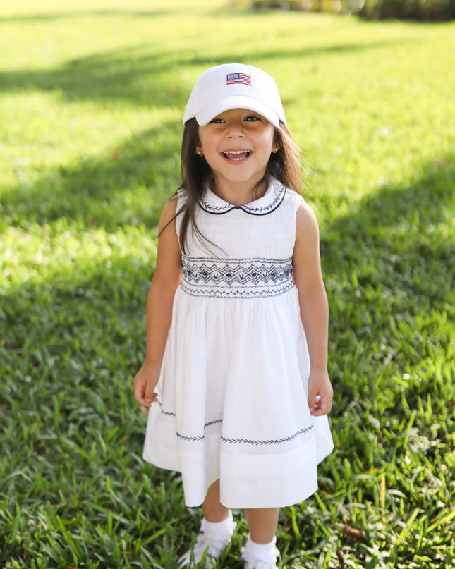 Girl wearing American Flag Bow Baseball Hat