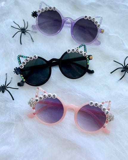 Pink, Black and Purple Halloween Cat Ears Sunglasses that say Hocus Pocus