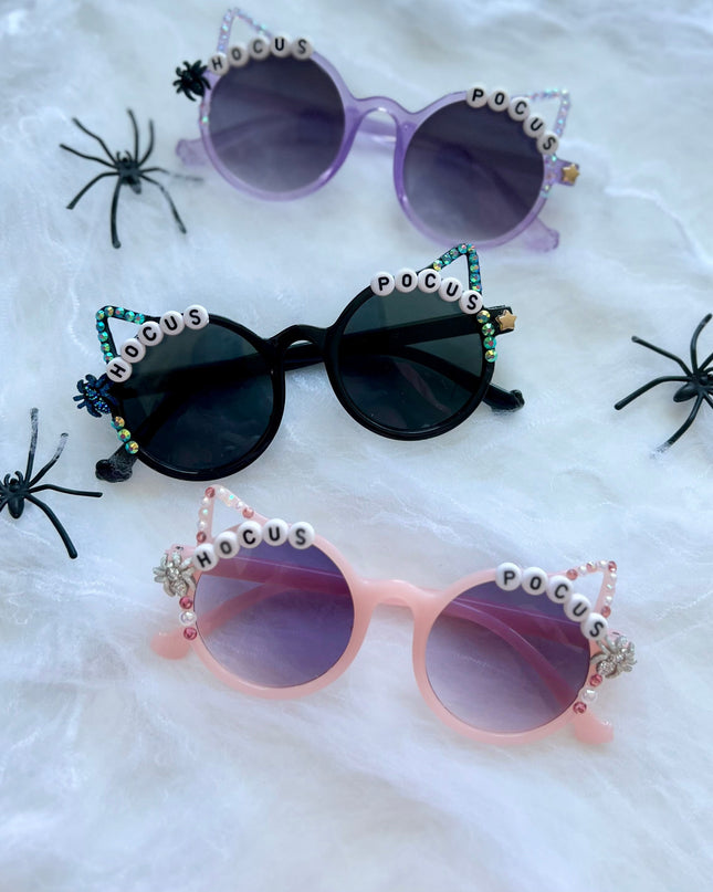 Pink, Black and Purple Halloween Cat Ears Sunglasses that say Hocus Pocus