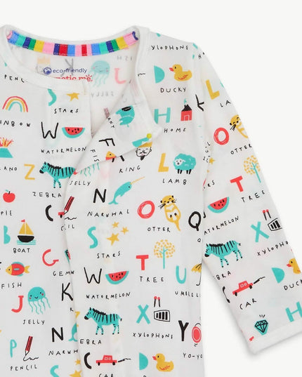 Closeup of magnetic footie pajamas in ABC's print