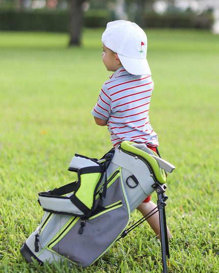 Little boy wearing. Golf Flag White Baseball Hat