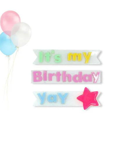 3 hair clips that say 'it's my' 'birthday' 'yay' 