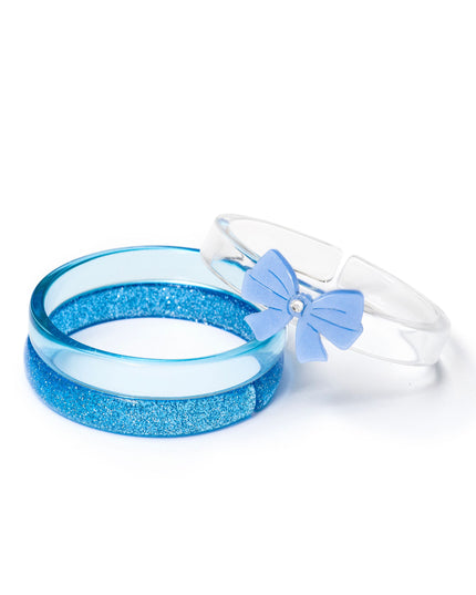 Bangle set with a blue glitter bangle, light blue bangle and clear bangle with a blue bow. 
