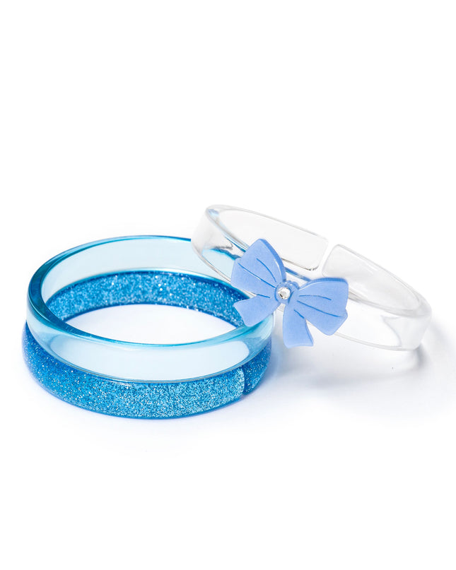Bangle set with a blue glitter bangle, light blue bangle and clear bangle with a blue bow. 