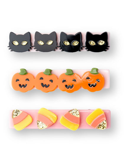 Hair Clips with black cats, pumpkins and candy corn.