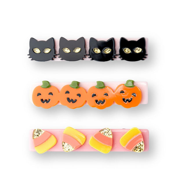 Hair Clips with black cats, pumpkins and candy corn.