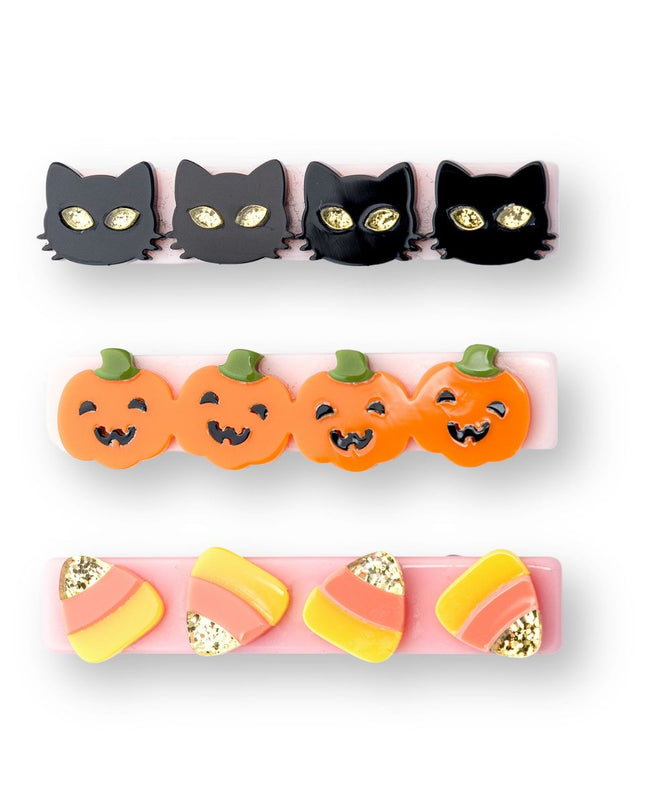 Hair Clips with black cats, pumpkins and candy corn.