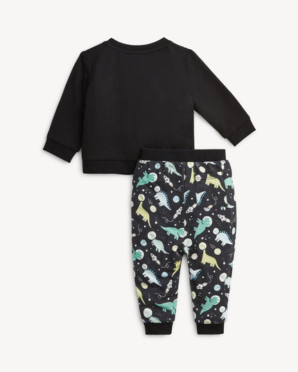 A two-piece kids lounge set featuring a black long-sleeve top with a dinosaur and space graphic, paired with black pants covered in a colorful dinosaur space print.