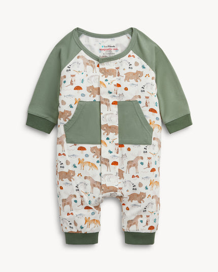 Baby romper with green raglan sleeves, pockets, and cuffs, featuring an all-over woodland animal print.