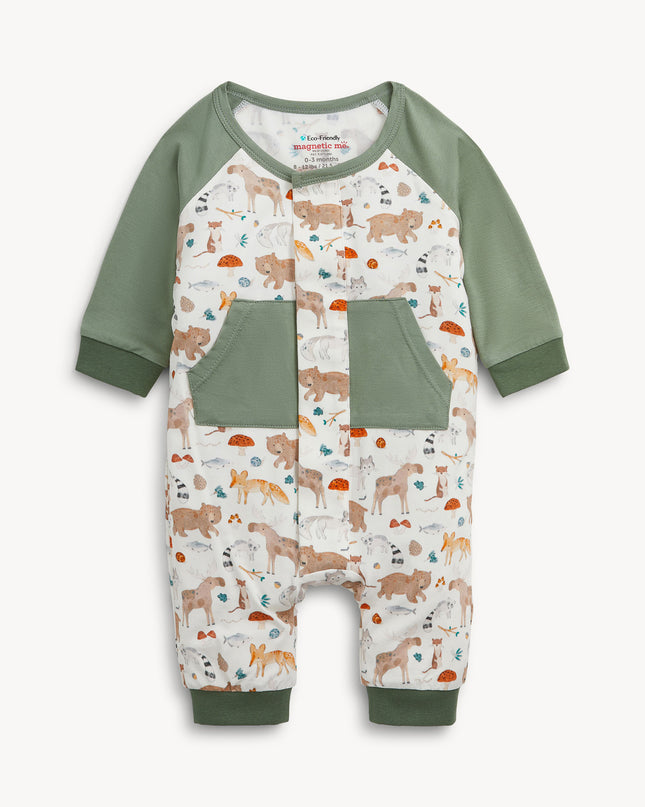 Baby romper with green raglan sleeves, pockets, and cuffs, featuring an all-over woodland animal print.