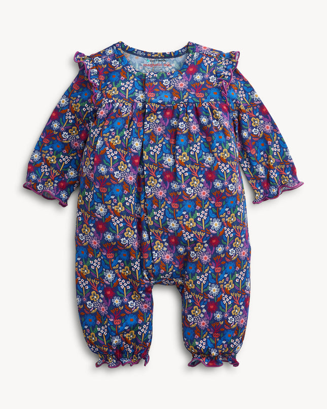 A baby girl's long-sleeve floral jumpsuit in a vibrant blue, purple, and pink mix, featuring ruffled shoulder details and gathered leg cuffs