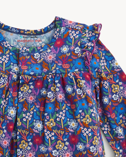 A baby girl's long-sleeve floral jumpsuit in a vibrant blue, purple, and pink mix, featuring ruffled shoulder details and gathered leg cuffs