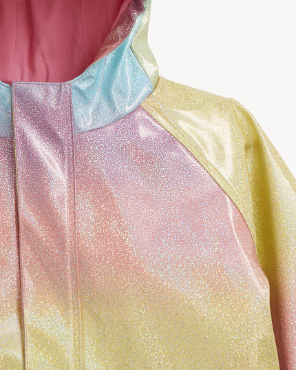Close up of rainbow unicorn sparkle raincoat with magnetic closures