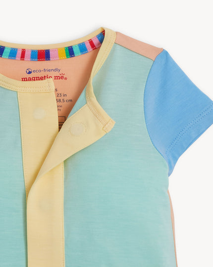 Closeup of blue, green and yellow magnetic romper