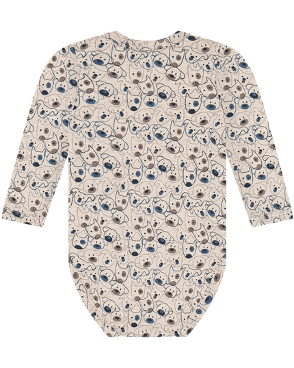 A long-sleeve beige baby bodysuit with an all-over cartoon dog print. The print features navy blue, brown, and black details.