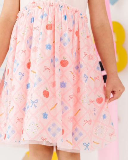 Girl wearing Pink tutu dress with back to school design
