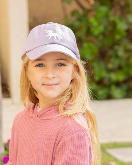 Girl wearing Rainbow Unicorn Bow Baseball Hat