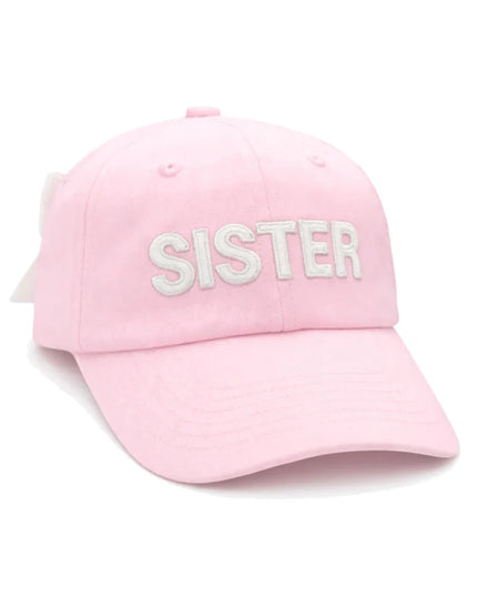 Pink baseball hat with 'SISTER' on front and white bow in the back