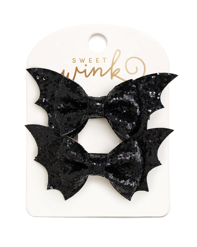 Black glittery bat bow hair clips 
