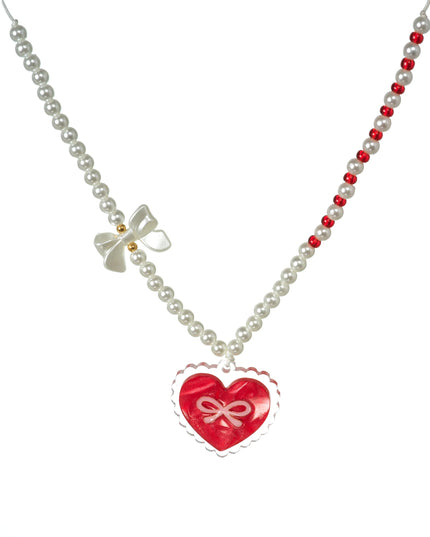 Red bow heart pendant necklace with white pearls. 
