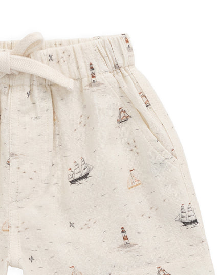 Cream shorts with sailboat print