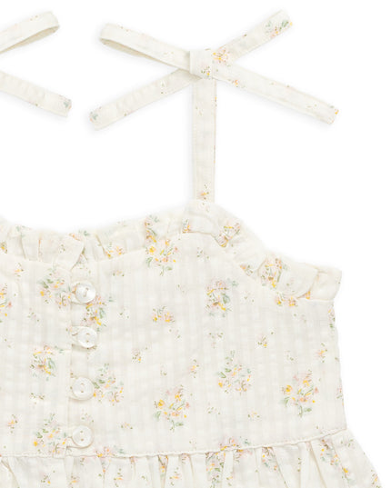 close up of cream and floral tank with tie sleeves